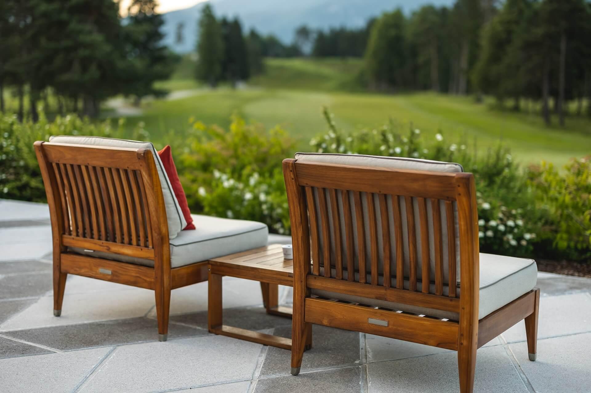 Outdoor seating at the resort with views of the course