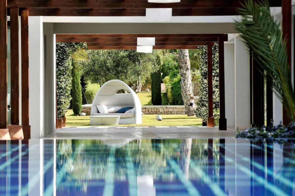 Swimming pool leading to an outdoor seating area at the Sofitel Essaouira Mogador Golf & Spa