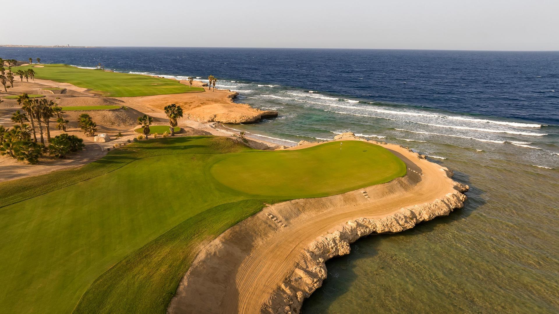 An island like green with coastal views at the Somabay Golf course