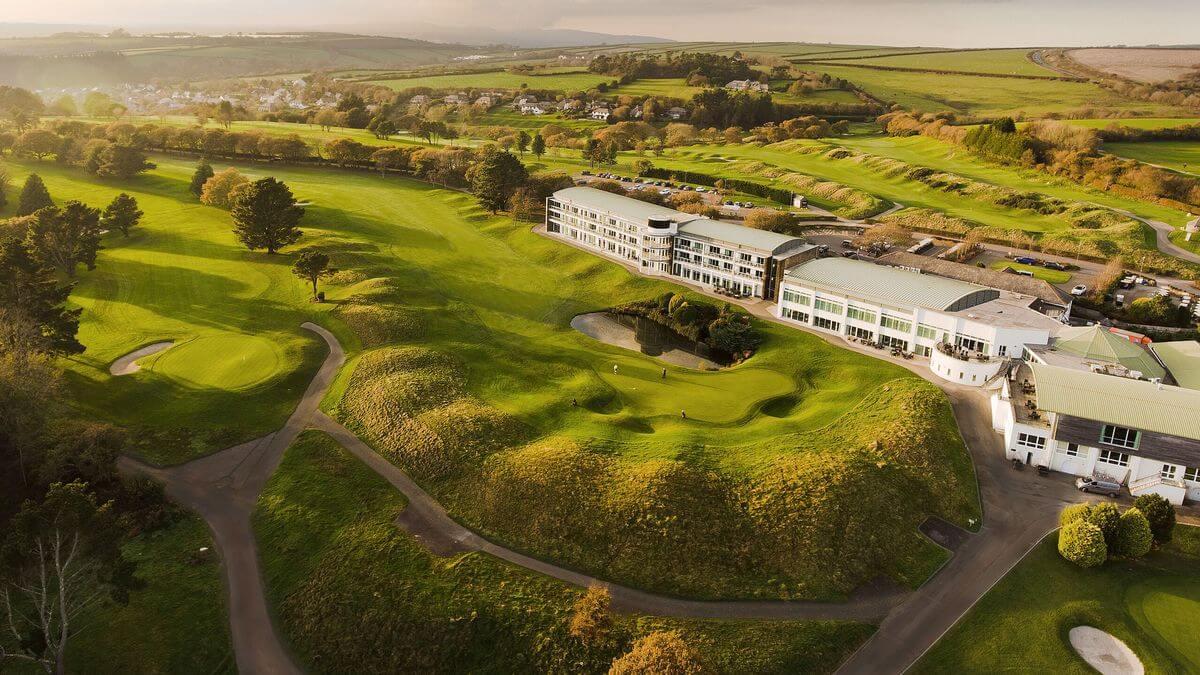 Birdseye view of the St. Mellion Estate looking out onto the course and pond
