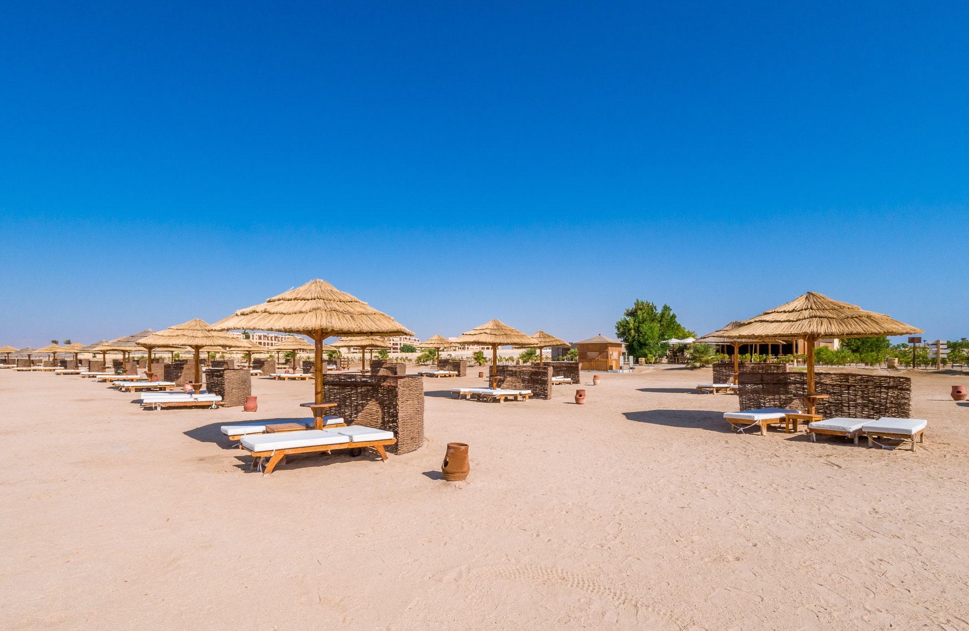 Beach side sunbeds at The Cascades Golf Resort, Spa & Thalasso