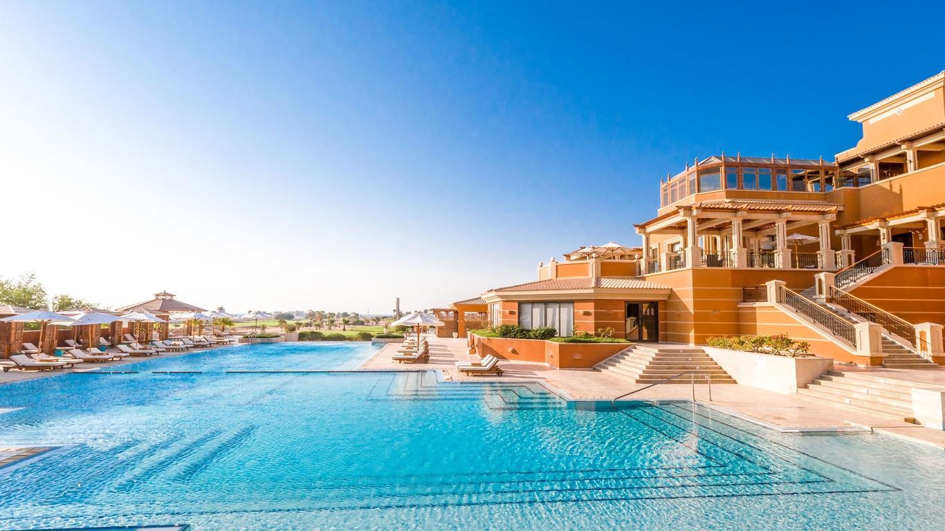 Panoramic view of The Cascades Golf Resort, Spa & Thalasso building and swimming pool