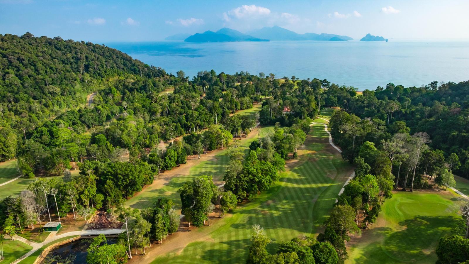 Aerial view of The Els Club Teluk Datai with oceam views