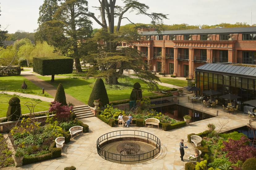 Birdseye view of people lounging in the garden at the country estate with unique nature designs