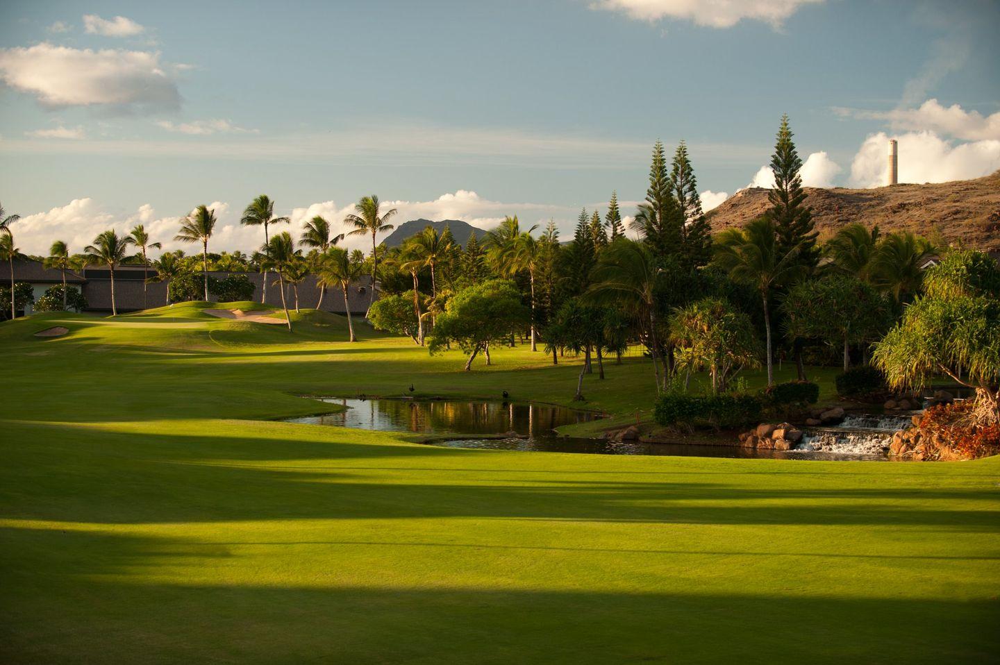 Fairwya winding around a water hazard
