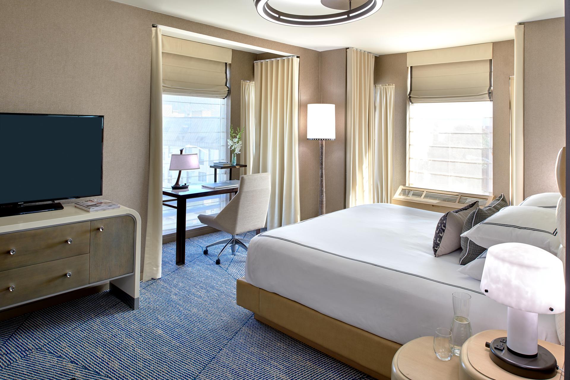 A modern double room following a cream design