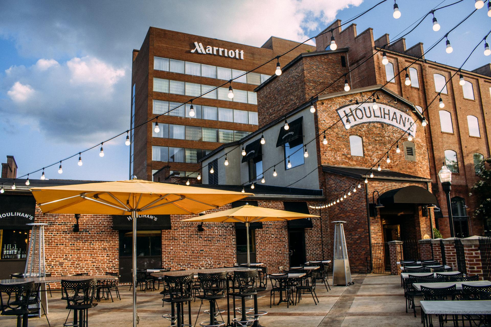 Exterior view of the Marriott hotel next to a bar